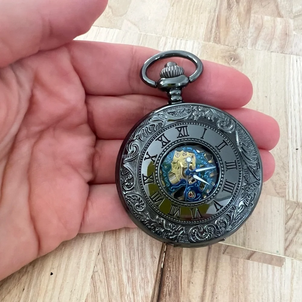 Black mechanical double sided Skelton peephole pocket watch working